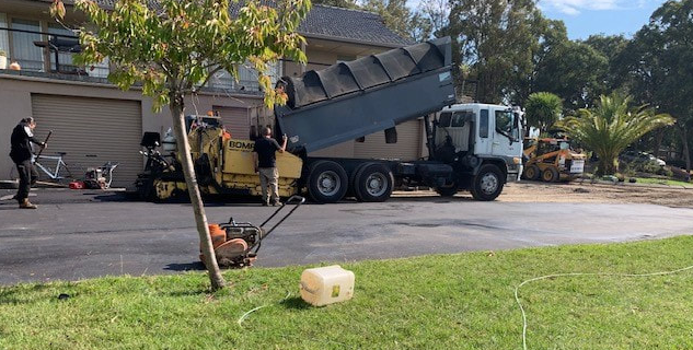 This is a photo of an asphalt driveway which is in the process of being installed by Dandenong South Road Tech